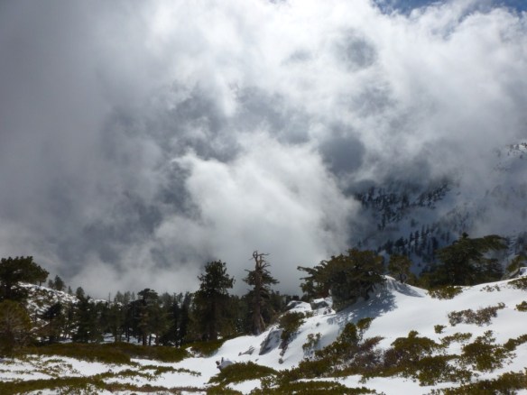Swirling and turbulent clouds made an amazing trek down to the trailhead.