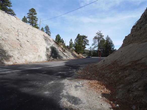 View from Pacific Crest Trailhead at Cloudburst Summit looking toward parking area where the PCT continues down to Cooper Canyon Campground.