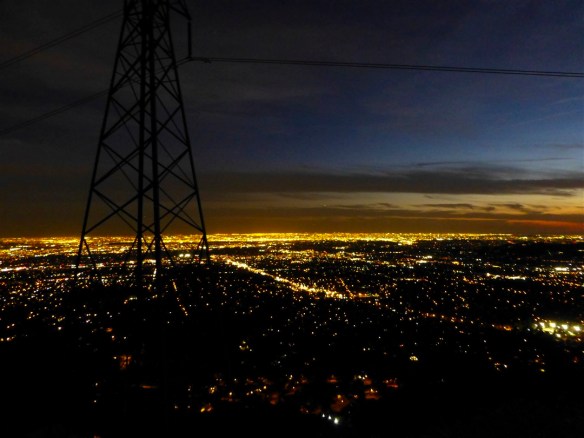 In addition to the obvious appeal of hiking to the White City ruins at Echo Mountain (elevation 3,207'); I've enjoyed the nighttime city glow numerous times with Echo Mountain being my last stop on long winter hikes preparing me for future treks to destinations like Mt. Whitney. No matter how late I was, I always saw people coming up the Sam Merrill Trail, many not bothering to use a headlamp. Watching a sunset on the peak and hiking back down at night is probably the best option for summer hikes.