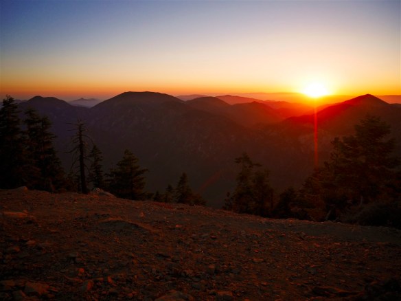 Remains of a fire lookout and cabin still occupy the summit of Mt. Islip (elevation 8,250) which is a popular destination for its views as well as its proximity to the Pacific Crest Trail, Crystal Lake (including the car camping campgrounds and cafe), and Little Jimmy Campground (possibly the best backpacking campground location in Angeles National Forest). Enjoying a nice sunset on the often cool and windy peak and then travelling down to spend the night in a tent at the much warmer protected area of Little Jimmy Campground (also near water at Little Jimmy Springs) is a great way to begin a backpacking trip--something lots of Boy Scouts do on Saturday nights.